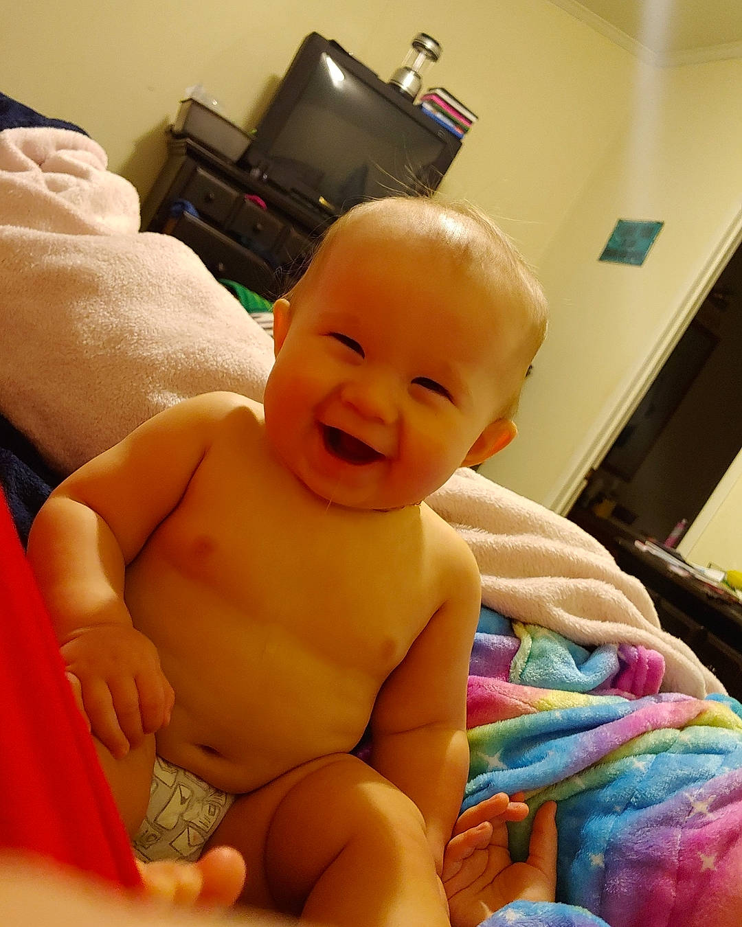 Brennan is registered to the contest to win money with this photo: abdomen, baby, cheek, chest, child, eye, face, finger, head, joy, leg, mouth, muscle, person, skin, smile, thumb, toddler, trunk