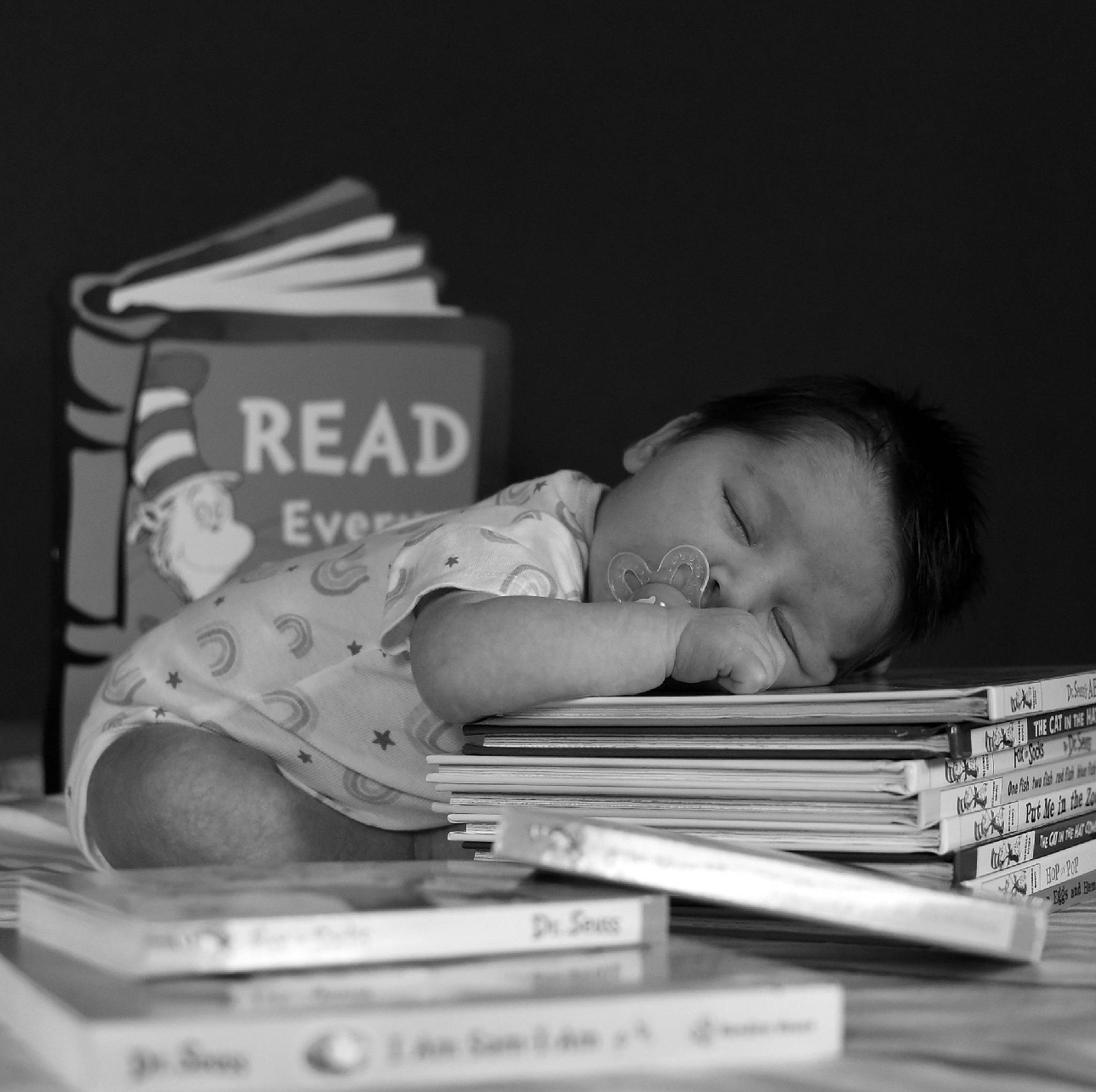 Kaitlynn joined the competition — help win amazing prizes! baby, baby_products, bedtime, book, child, comfort, font, hand, monochrome, monochrome_photography, nap, person, portrait_photography, publication, reading, room, sitting, still_life_photography, stock_photography, toddler