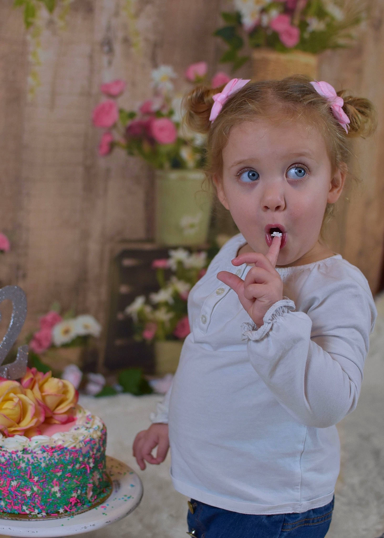 Emileigh joined the competition — help win amazing prizes! baby_toddler_clothing, cake, cake_decorating, dress, event, face, flower, food, happy, icing, ingredient, person, petal, pink, plant, sugar_cake, sugar_paste, surprise, sweetness, tableware