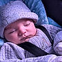 baby, blanket, blue, child, closeup, clothing, comfort, cozy, cushion, cute, face, hat, indoors, infant, peaceful, portrait, rest, sleeping, soft, strap