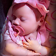 Kashlynn is registered to the contest to win money with this photo: adorable, baby, blanket, child, closeup, clothing, cozy, cute, headband, indoors, infant, nail_polish, newborn, pacifier, peaceful, pink_bow, portrait, resting, sleeping, soft_lighting