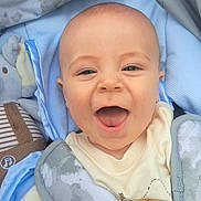 Arran is registered to the contest to win money with this photo: baby, baby_clothes, blanket, blue, car_seat, child, clothing, cute, expression, face, happy, head, indoors, infant, people, plush_toy, portrait, seatbelt, smiling, young_child