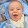 baby, baby_clothes, blanket, blue, car_seat, child, clothing, cute, expression, face, happy, head, indoors, infant, people, plush_toy, portrait, seatbelt, smiling, young_child
