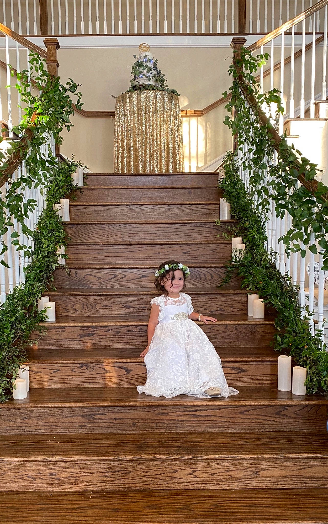 Arielle is registered to the contest to win money with this photo: architecture, bridal_accessory, bridal_clothing, bridal_party_dress, bridal_veil, bride, clothing, dress, flooring, formal_wear, gown, happy, headwear, joy, lighting, person, plant, porch, stairs, veil