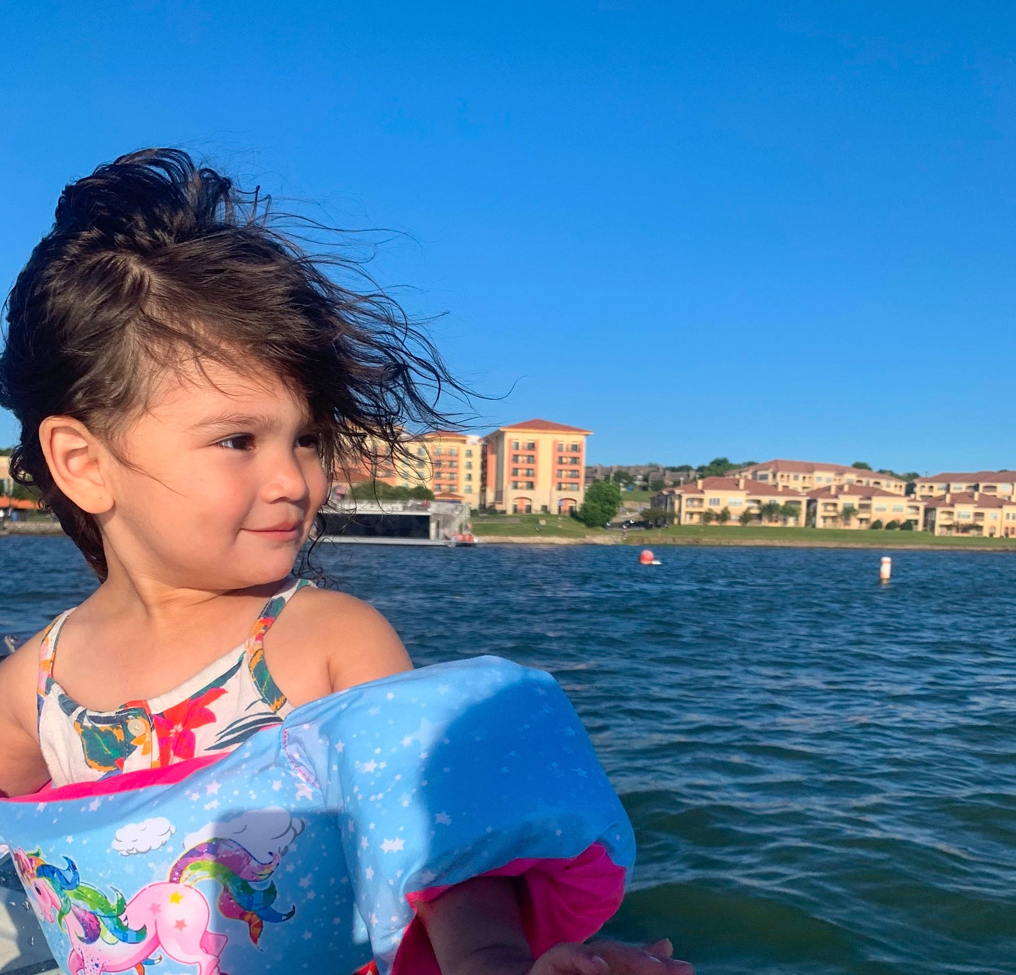 Arielle joined the competition — help win amazing prizes! azure, baby_toddler_clothing, beach, beauty, blue, boats_and_boating_equipment_and_supplies, electric_blue, fun, happy, joy, lake, leisure, ocean, person, recreation, sky, summer, t_shirt, toddler, tourism