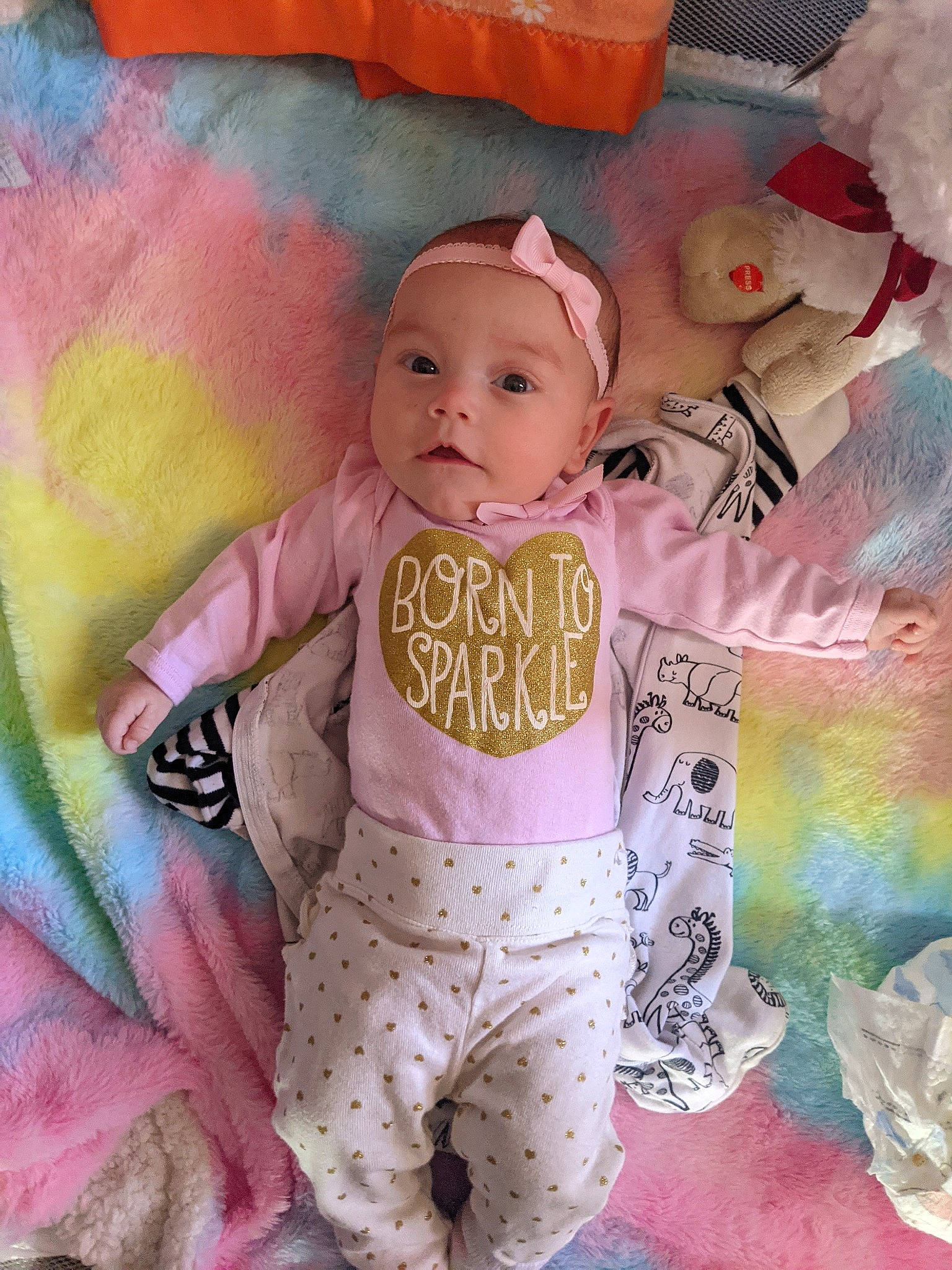 Khaleesi joined the competition — help win amazing prizes! baby, baby_products, baby_toddler_clothing, cheek, child, cool, happy, hat, headwear, linens, magenta, mammal, pattern, person, pink, product, skin, sleeve, t_shirt, textile