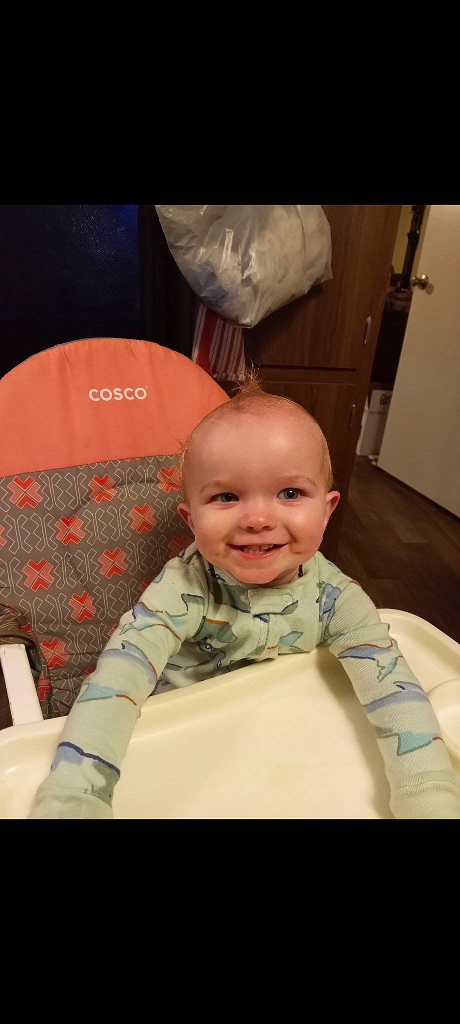 Gage is registered to the contest to win money with this photo: baby, baby_laughing, baby_products, baby_toddler_clothing, carmine, cheek, child, comfort, fashion_accessory, flooring, fun, happy, joy, pattern, person, room, sitting, sleeve, smile, toddler