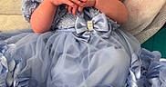 Adeline joined the competition — help win amazing prizes! baby, blanket, blue, clothing, cute, dress, fabric, flower, hands, indoors, infant, netting, newborn, peaceful, person, portrait, resting, sleeping, soft, tulle