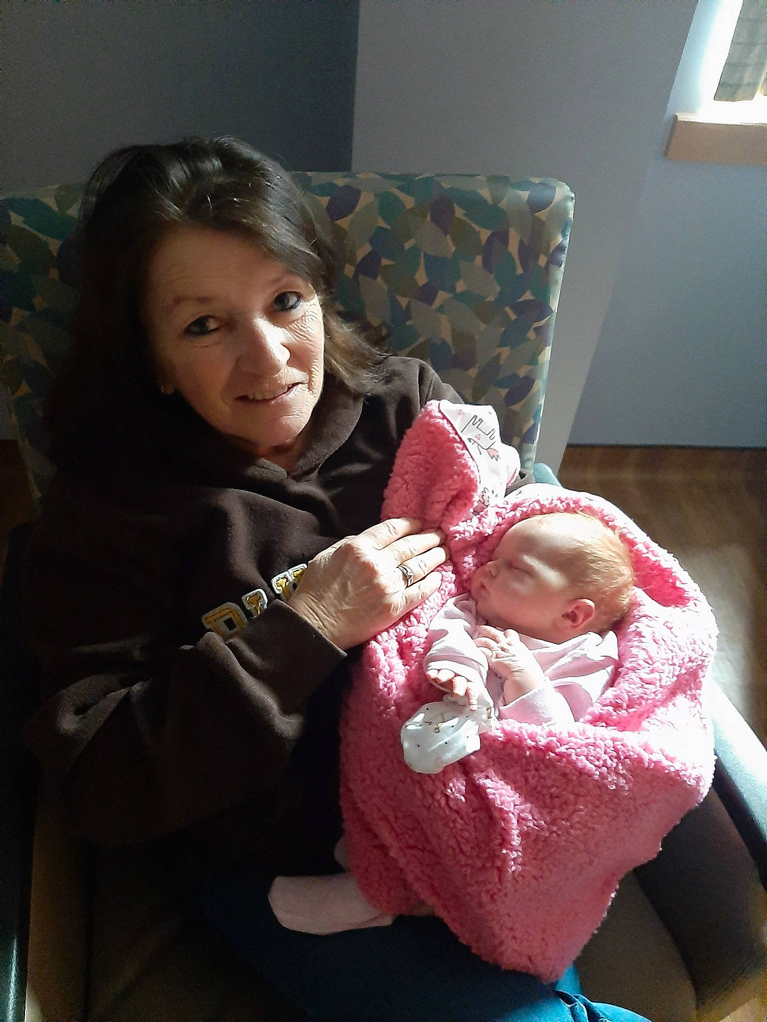 Aimee is registered to the contest to win money with this photo: brown_hair, child, ear, person, pink, room, sitting, skin, textile, toddler, toy