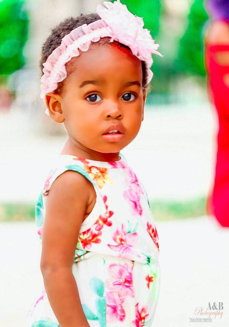 Sagine is registered to the contest to win money with this photo: baby, baby_toddler_clothing, child, child_model, fashion_accessory, hair_accessory, headband, headgear, headpiece, person, pink, skin, smile, toddler