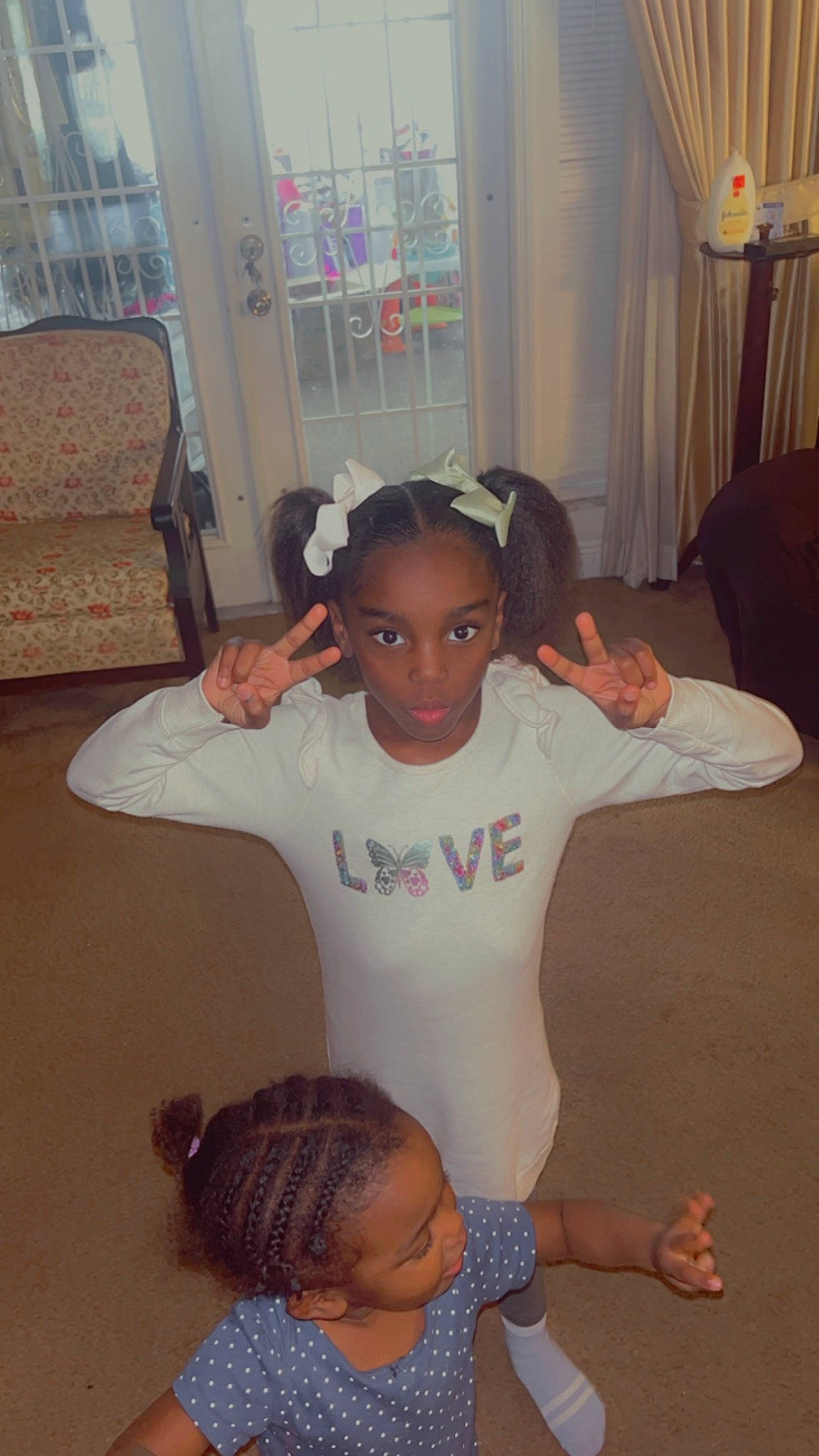 Nyla joined the competition — help win amazing prizes! baby_toddler_clothing, chest, curtain, face, floor, flooring, gesture, hair, happy, head, joint, knee, neck, person, skin, sleeve, thigh, thumb, toddler, trunk