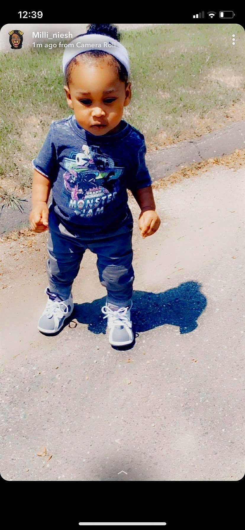 Kyrie is registered to the contest to win money with this photo: baby, baby_toddler_clothing, child, denim, electric_blue, eye, fun, grass, happy, leg, people_in_nature, person, play, recreation, shoe, sitting, sleeve, sneakers, soil, t_shirt