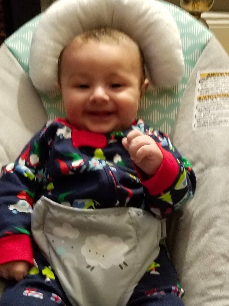 Adonis is registered to the contest to win money with this photo: baby, baby_toddler_clothing, cheek, child, collar, comfort, cool, face, happy, head, jacket, joy, mouth, nose, outerwear, person, product, skin, sleeve, smile