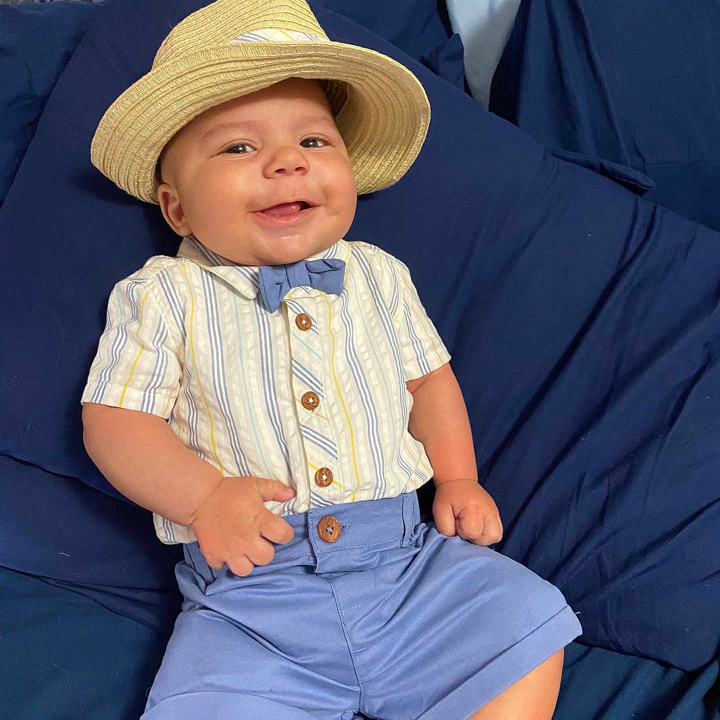 Kayden joined the competition — help win amazing prizes! accessories, baby, beachwear, beanbag, blanket, blouse, clothing, face, formalwear, furniture, happy, hat, head, person, shorts, sitting, sleeve, smile, tie