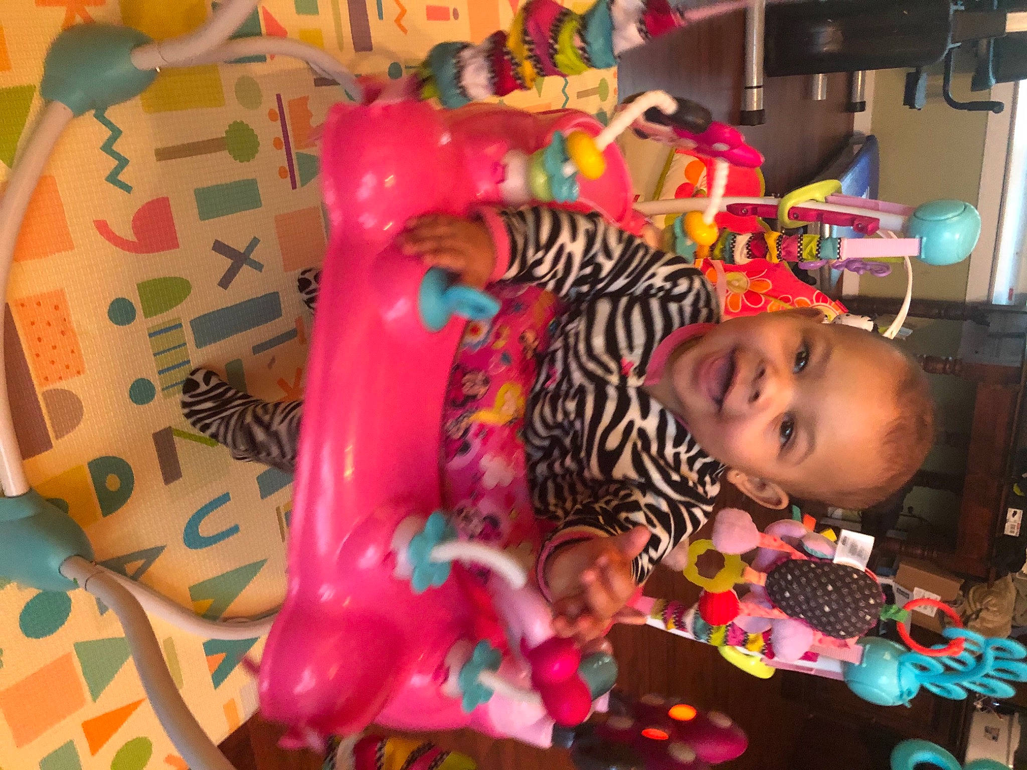Michaela joined the competition — help win amazing prizes! baby, baby_toys, child, event, fun, happy, house, joy, magenta, party, party_supply, pattern, person, pink, plastic, play, room, smile, textile, toddler