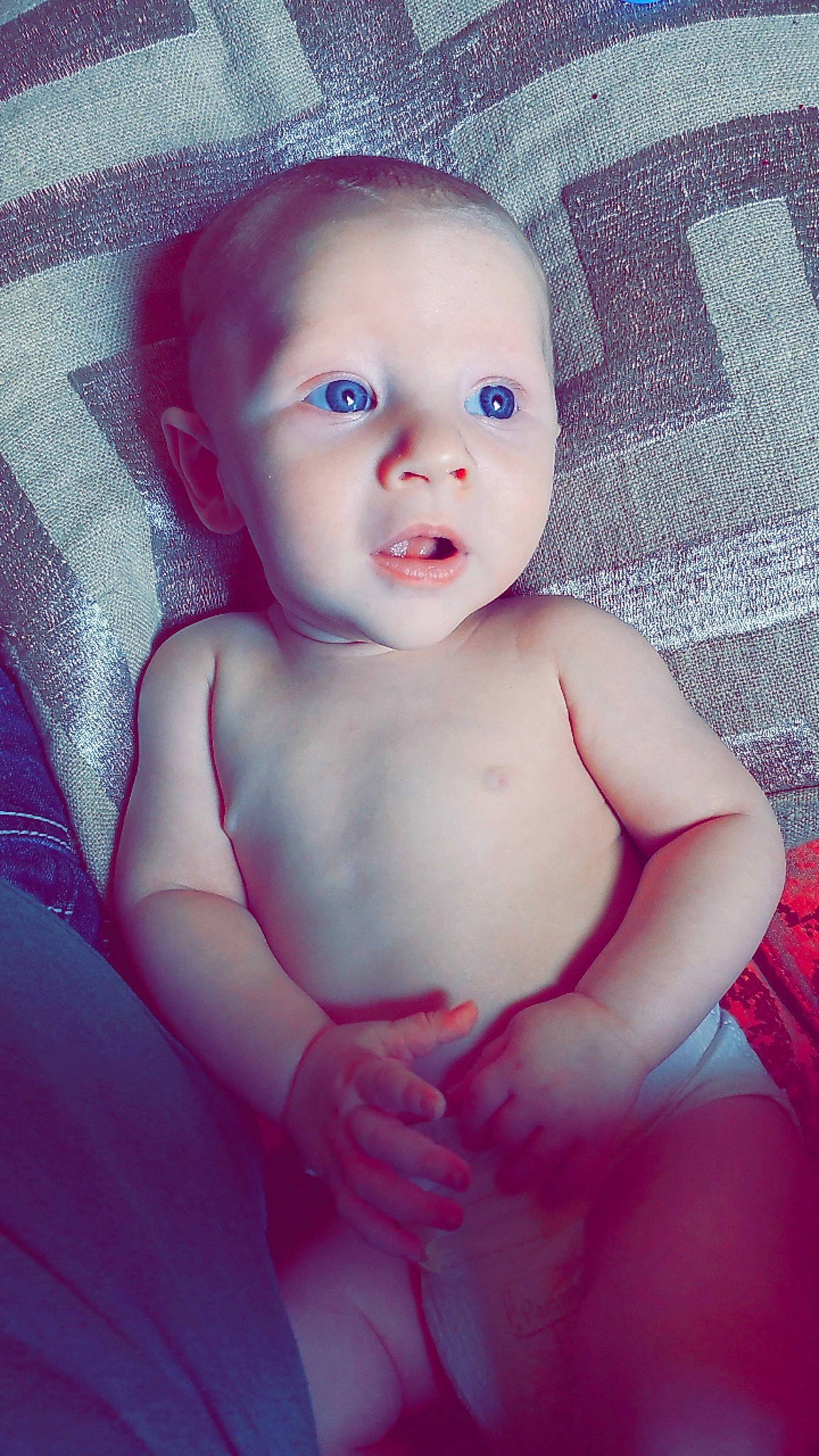 Jaxtyn is registered to the contest to win money with this photo: baby, baby_toddler_clothing, cheek, chest, child, electric_blue, eyebrow, eyelash, flash_photography, flesh, iris, lip, magenta, no_expression, pattern, person, pink, portrait_photography, skin, stomach