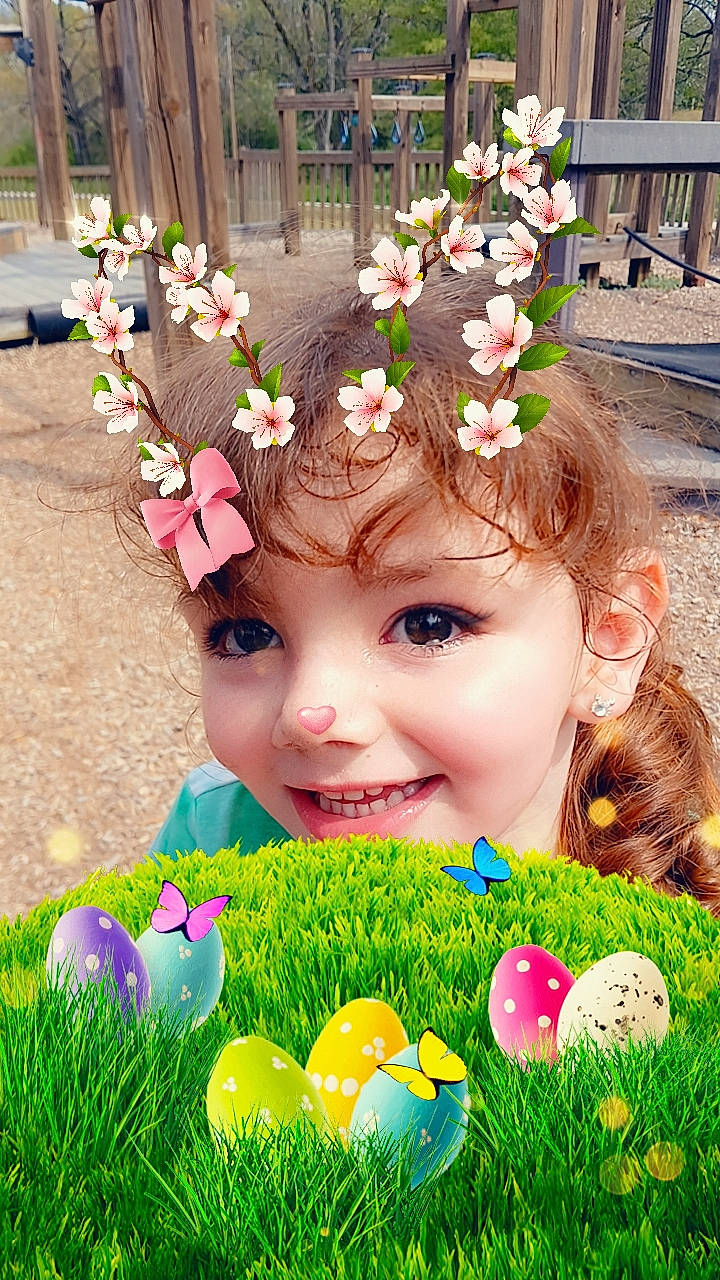 Taylor joined the competition — help win amazing prizes! beauty, child, event, eyelash, flower, fun, grass, happy, headpiece, joy, lei, people, people_in_nature, person, petal, photograph, pink, plant, smile, spring