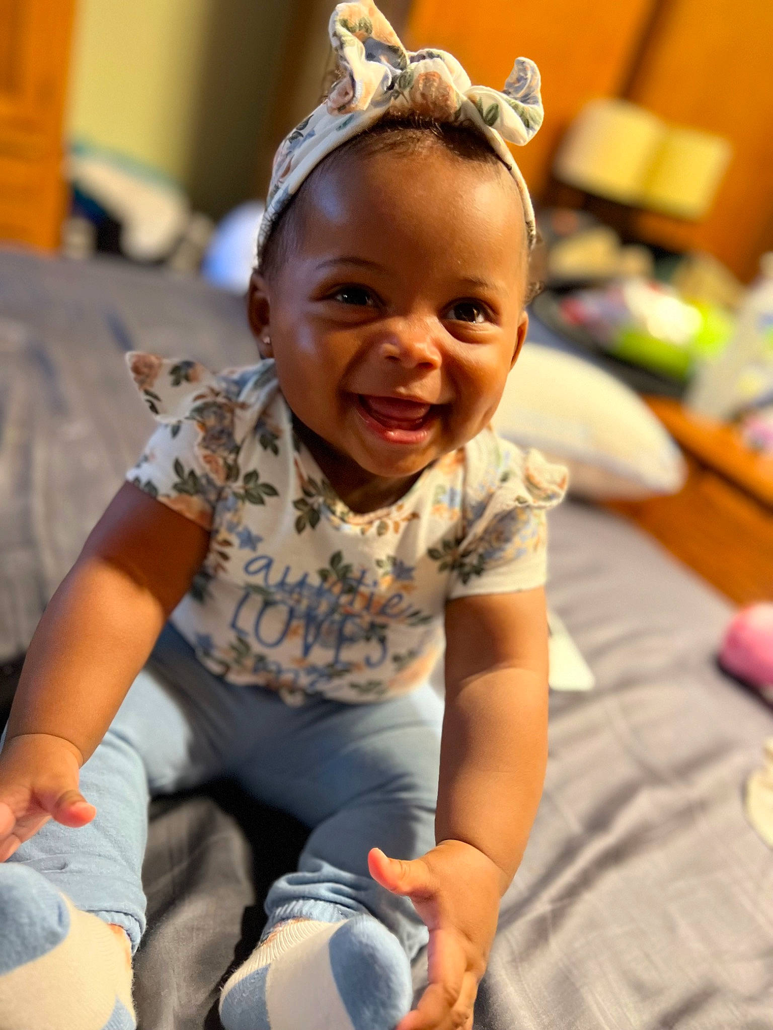 Quinn joined the competition — help win amazing prizes! baby, baby_toddler_clothing, child, event, flooring, fun, happy, headpiece, human_body, joy, laugh, leisure, party, people, person, recreation, sitting, skin, smile, t_shirt