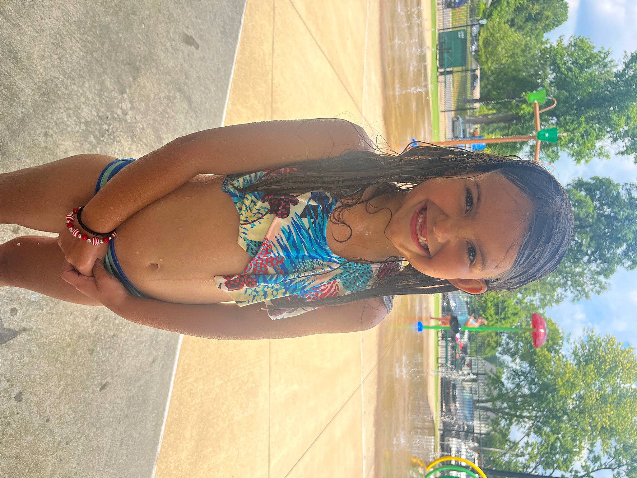 Rilei is registered to the contest to win money with this photo: abdomen, brassiere, chest, cool, fun, hairstyle, happy, human_leg, joy, leisure, navel, person, sky, smile, summer, swimsuit_top, swimwear, thigh, travel, tree