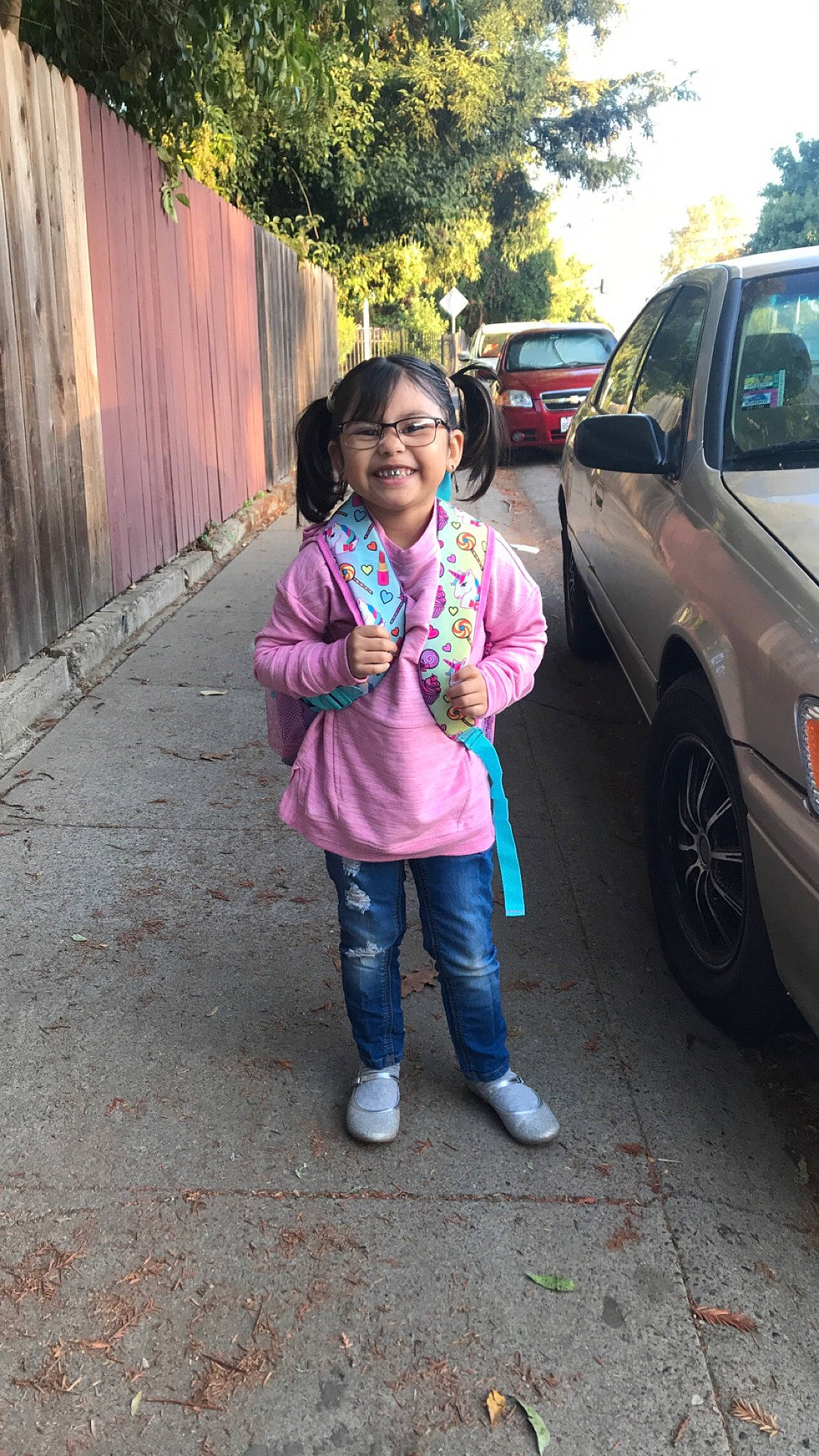 Abigael joined the competition — help win amazing prizes! car, child, family_car, jeans, joy, luxury_vehicle, person, plant, smile, subcompact_car, vehicle, vehicle_door