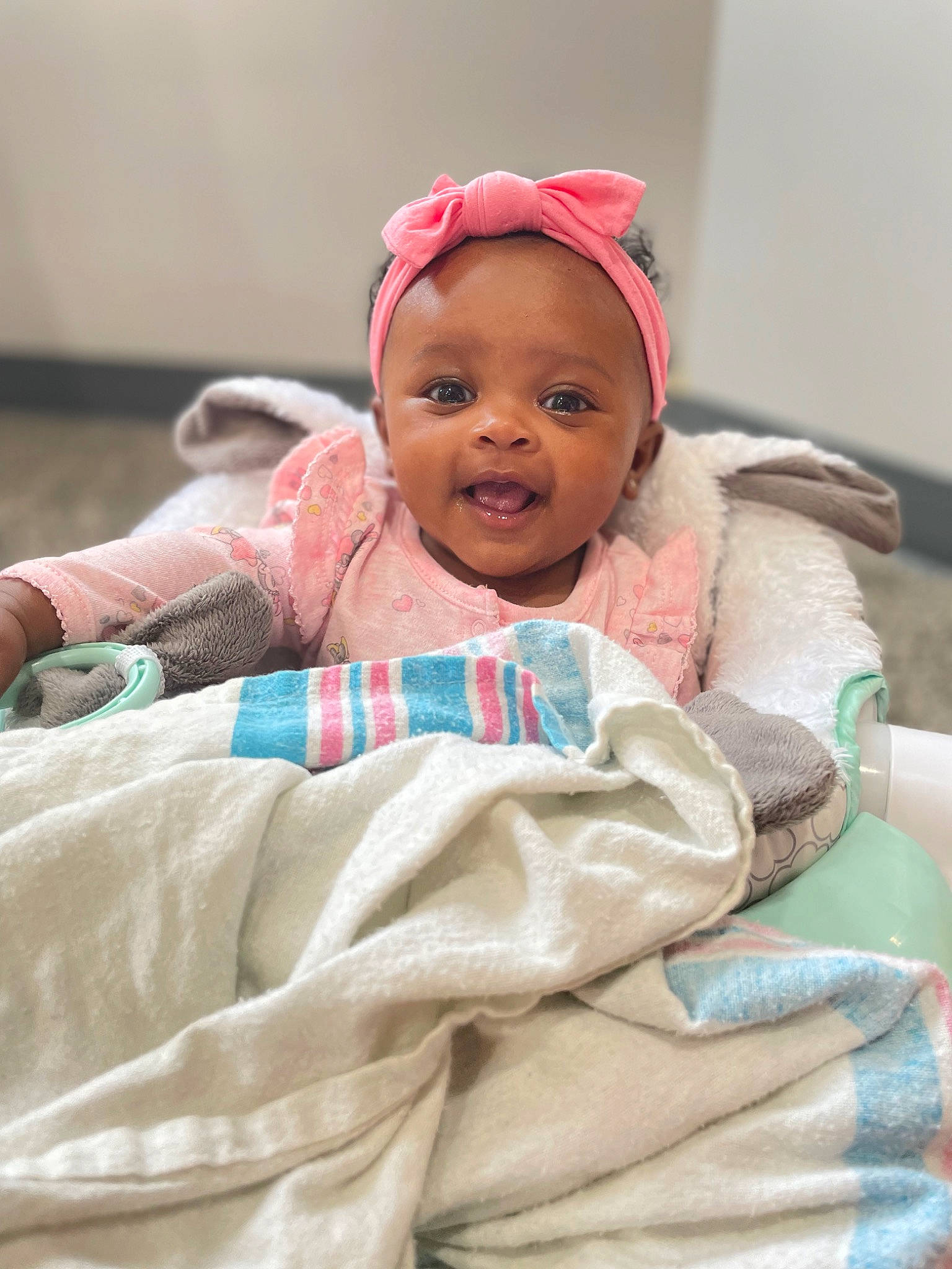 Harmony joined the competition — help win amazing prizes! baby, baby_products, baby_safety, baby_toddler_clothing, bedding, cheek, child, comfort, eye, happy, laugh, linens, magenta, person, room, sitting, skin, sleeve, smile, textile