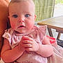 Oakley joined the competition — help win amazing prizes! baby, infant, child, hands, pink_clothing, blue_eyes, rosy_cheeks, blanket, soft_fabric, indoor, seated, curious_expression, cute, portrait, closeup, person, skin, head, face, young
