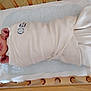 Joseph is registered to the contest to win money with this photo: newborn, baby, sleeping, blanket, crib, wooden_crib, bedding, wrapped, infant, peaceful, indoors, child, face, head, resting, swaddled, soft, comfort, cuddle, serene