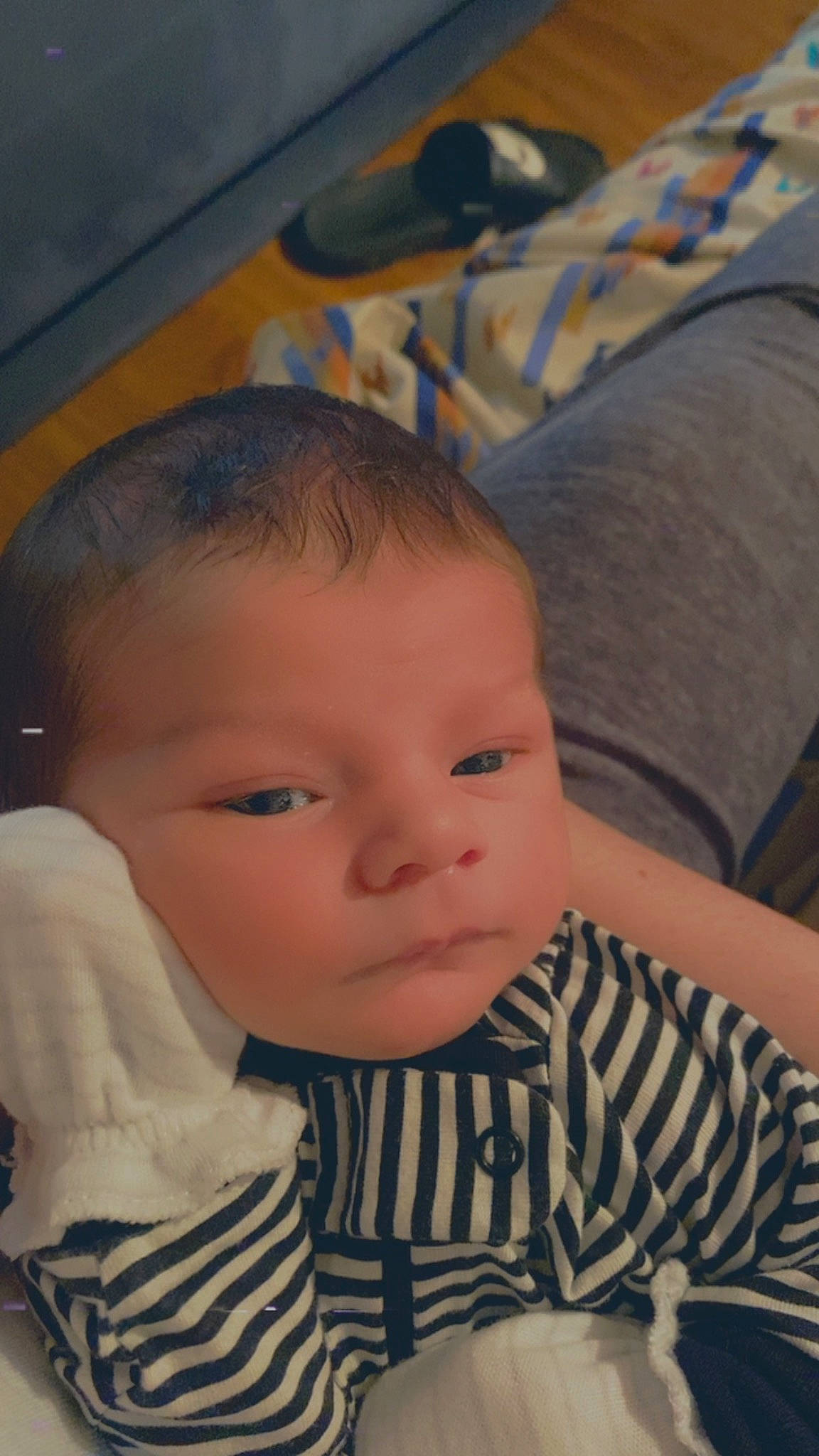 Christian is registered to the contest to win money with this photo: baby, baby_toddler_clothing, cheek, child, chin, comfort, ear, eye, eyebrow, eyelash, iris, lip, mouth, nose, person, sitting, skin, sleeve, smile, textile