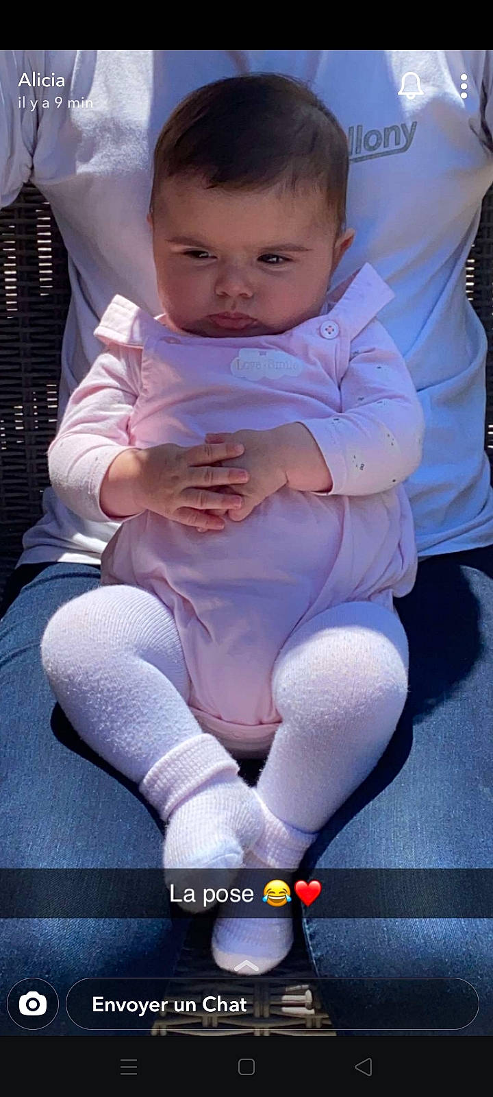 Dayana participe au concours pour gagner de l'argent avec cette photo : baby, baby_toddler_clothing, comfort, dress, eye, finger, gesture, happy, knee, lap, leg, lip, nail, person, pink, skin, sleeve, sock, thigh, thumb