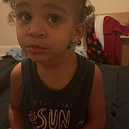 Demarcus joined the competition — help win amazing prizes! architecture, bodypart, building, child, clothing, couch, face, female, finger, furniture, girl, hand, head, homedecor, indoors, person, photography, portrait, sitting, t_shirt