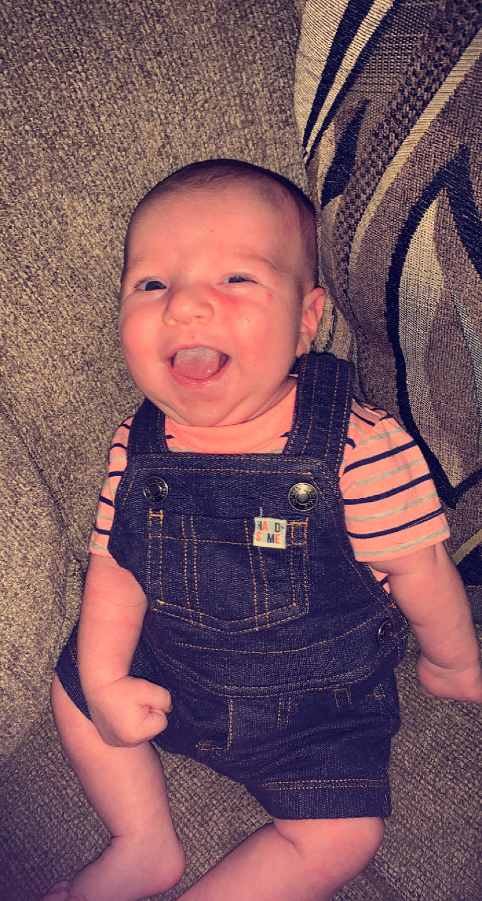 Grayson is registered to the contest to win money with this photo: baby, baby_toddler_clothing, cheek, chest, cool, dress, eyelash, finger, gesture, happy, human_body, iris, lip, mouth, neck, person, shoulder, skin, sleeve, toddler