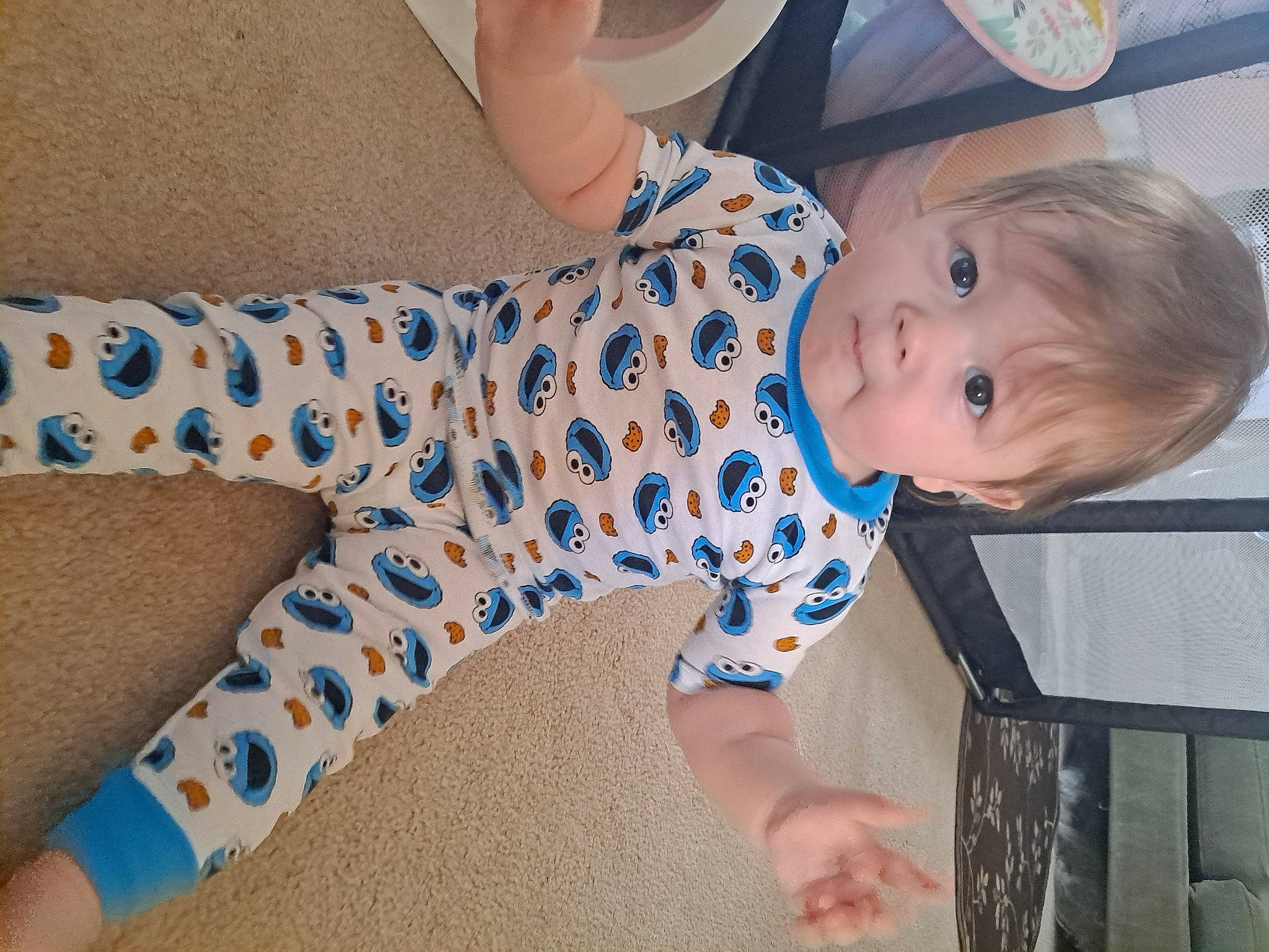 Draven joined the competition — help win amazing prizes! arm, baby, baby_toddler_clothing, barefoot, child, electric_blue, flooring, foot, fun, happy, head, human_leg, knee, pattern, person, sitting, skin, sleeve, smile, thigh