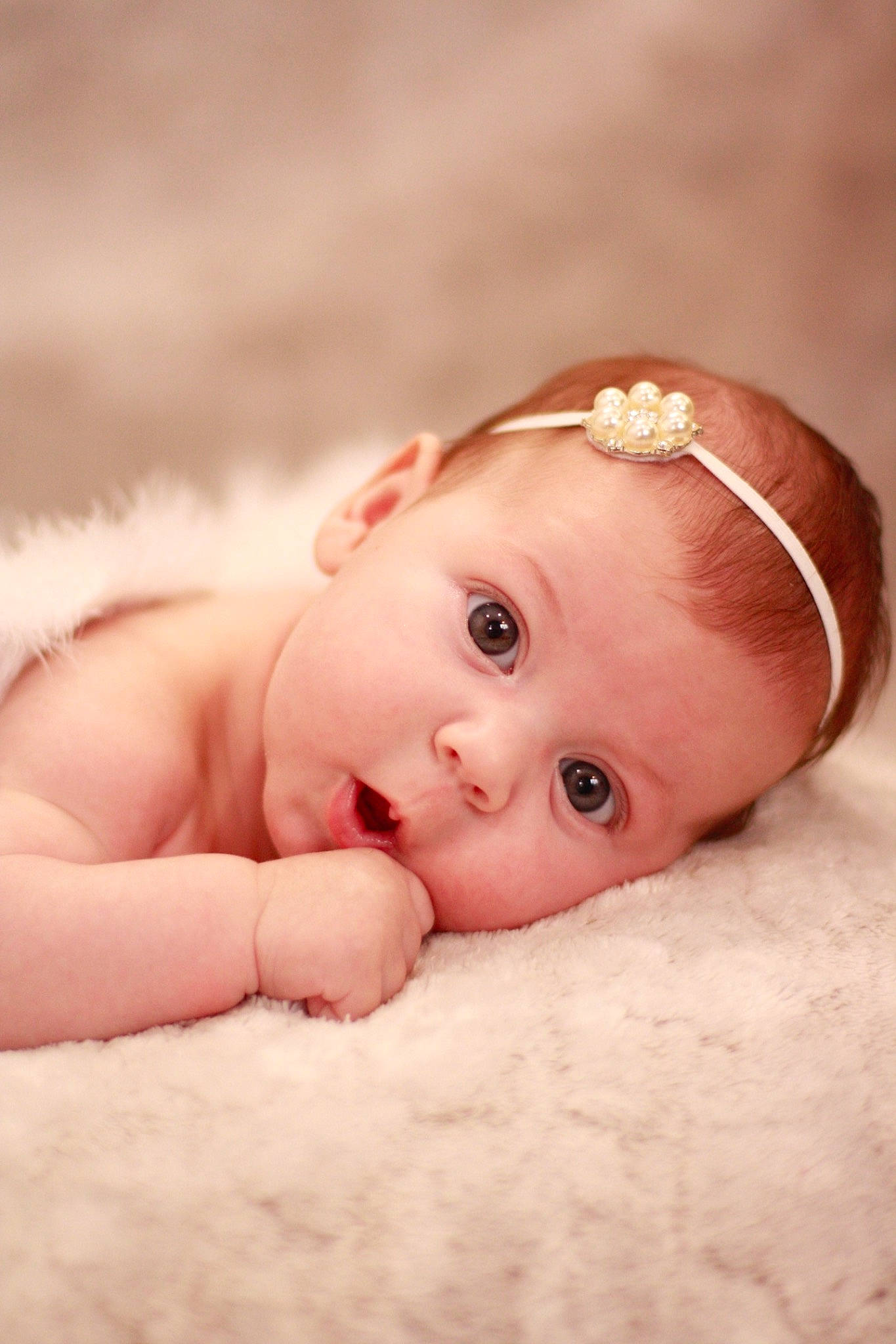 Calista participe au concours pour gagner de l'argent avec cette photo : baby, cheek, child, close_up, eye, face, forehead, hand, head, headgear, iris, lip, mouth, nose, person, photograph, photography, pink, portrait_photography, skin