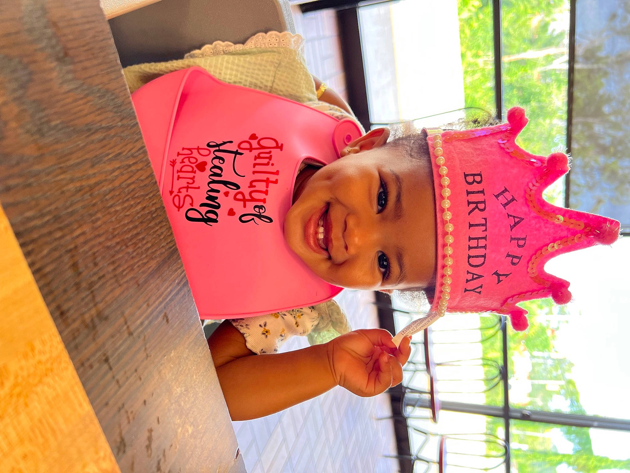 Zhavia is registered to the contest to win money with this photo: carmine, child, facial_expression, fun, hand, handwriting, happy, hardwood, hat, headwear, joy, leisure, lip, magenta, peach, person, pink, skin, smile, t_shirt