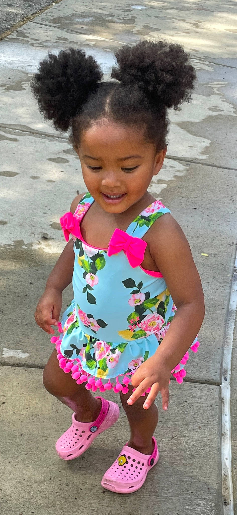 Zhavia is registered to the contest to win money with this photo: adaptation, baby_toddler_clothing, child, day_dress, dress, facial_expression, fun, hairstyle, happy, joy, magenta, organ, pattern, person, photograph, pink, skin, sleeve, smile, standing