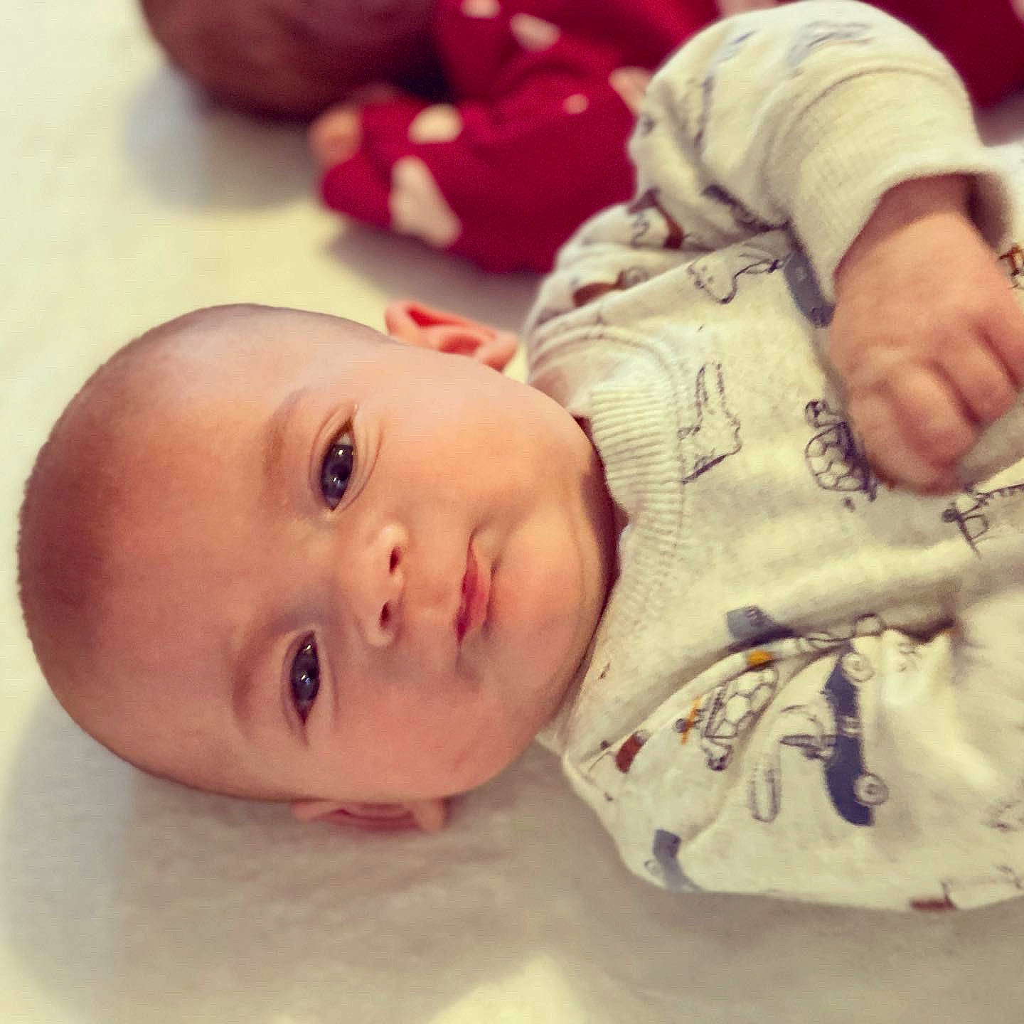 Kolton is registered to the contest to win money with this photo: baby, baby_toddler_clothing, cheek, child, eyebrow, facial_expression, forehead, iris, lip, mouth, nose, organ, overall, person, skin, toddler