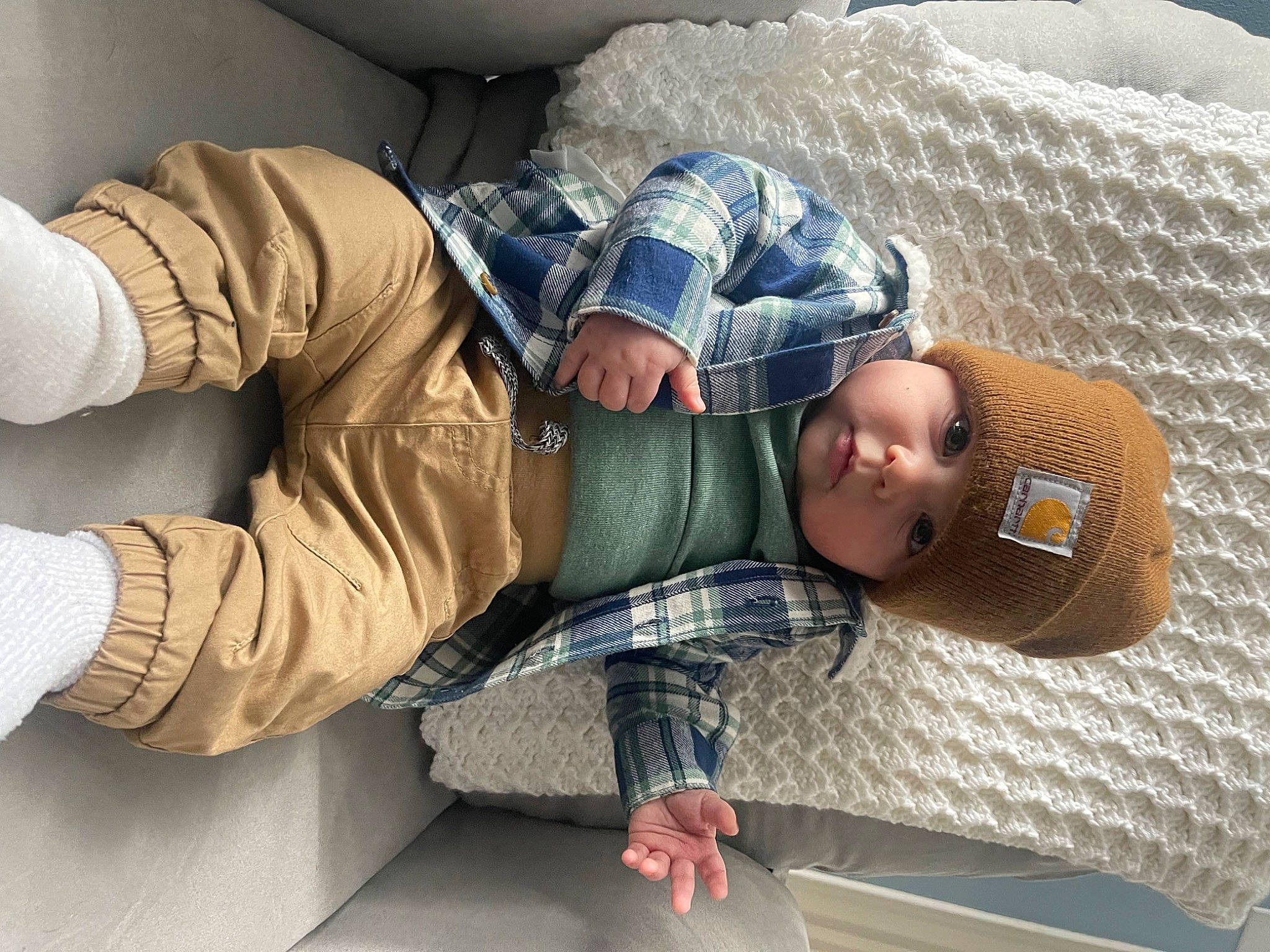 Layton is registered to the contest to win money with this photo: baby, baby_toddler_clothing, child, comfort, denim, eyewear, flooring, glasses, headwear, human_leg, knee, leisure, linens, nap, pattern, person, sitting, sleep, sleeve, toddler