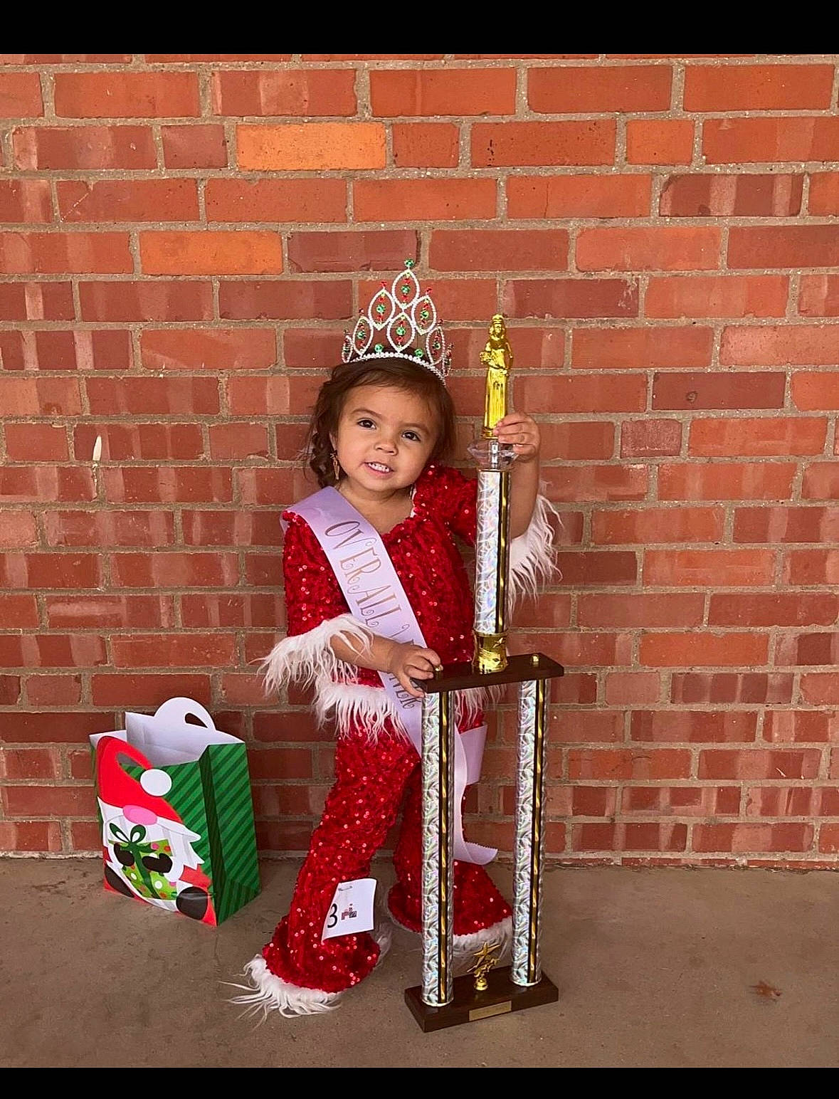 Sophia Rose joined the competition — help win amazing prizes! brick, brickwork, carmine, child, costume, costume_hat, event, folk_instrument, fun, idiophone, joy, magenta, musical_instrument, musician, person, sitting, smile, toddler, tradition