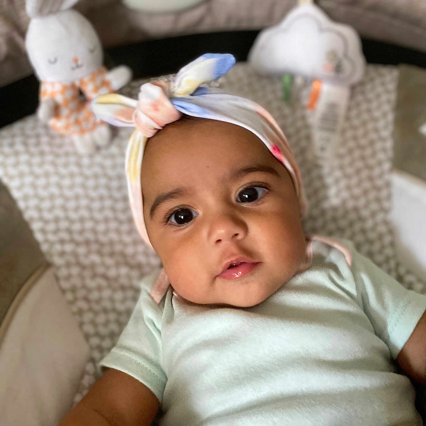 Olivia joined the competition — help win amazing prizes! baby, bed, bonnet, cap, clothing, crib, cushion, face, furniture, happy, hat, head, homedecor, infantbed, newborn, people, person, photography, portrait, smile
