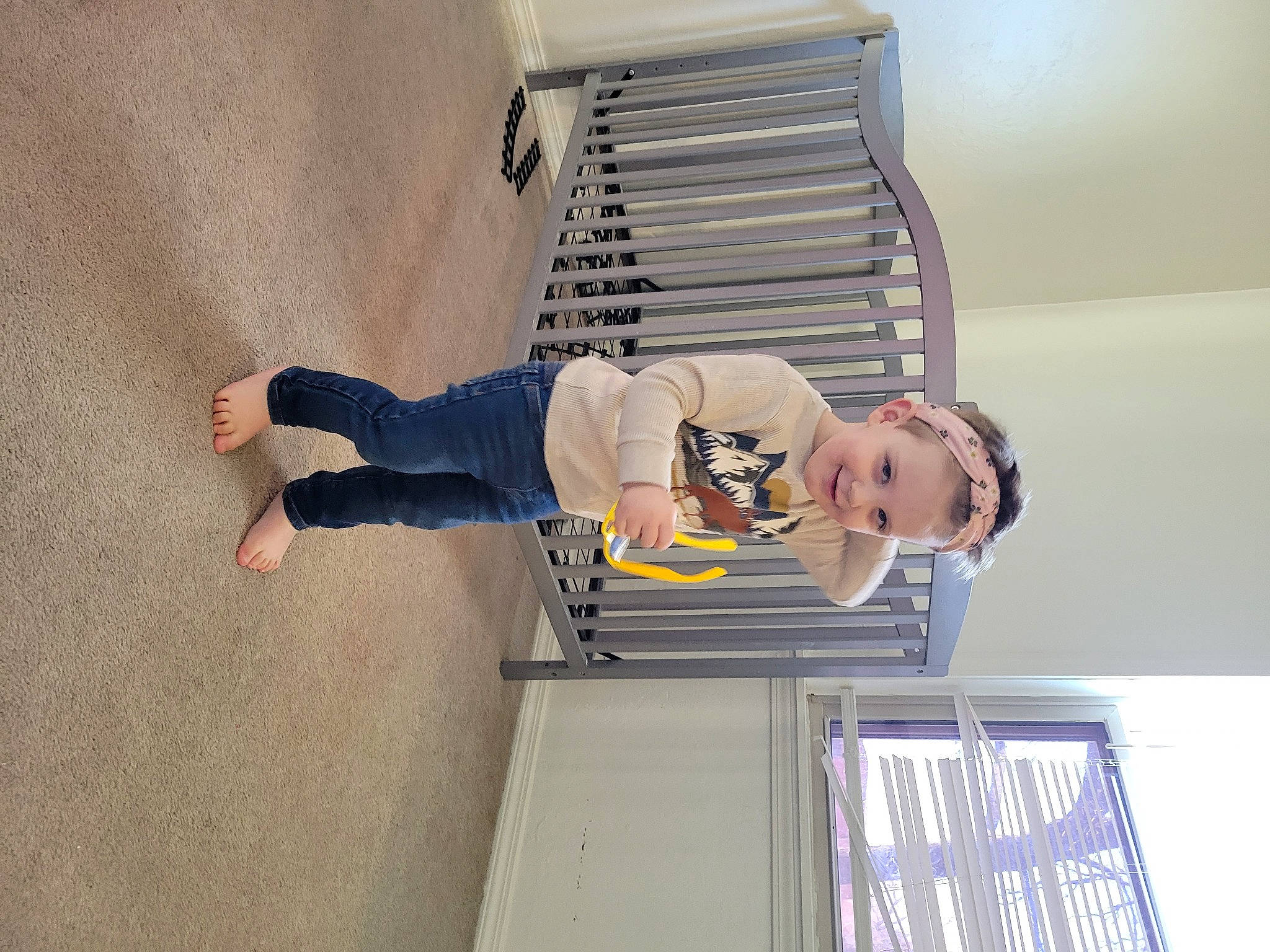 Jeremiah is registered to the contest to win money with this photo: ceiling, comfort, elbow, foot, human_leg, joy, knee, outdoor_shoe, paint, person, room, shorts, sportswear, t_shirt, thigh, walking_shoe, window, wrist