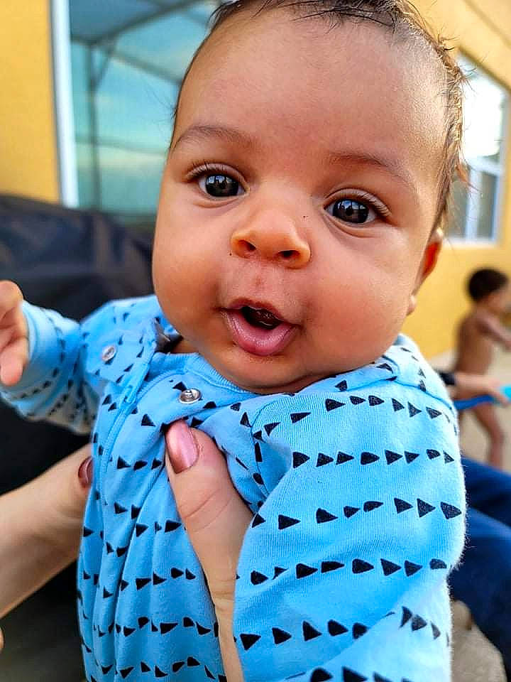 Jeremiah joined the competition — help win amazing prizes! arm, baby, baby_toddler_clothing, blue, cheek, collar, cool, eyelash, face, facial_expression, finger, hand, happy, head, neck, nose, person, shoulder, skin, sleeve