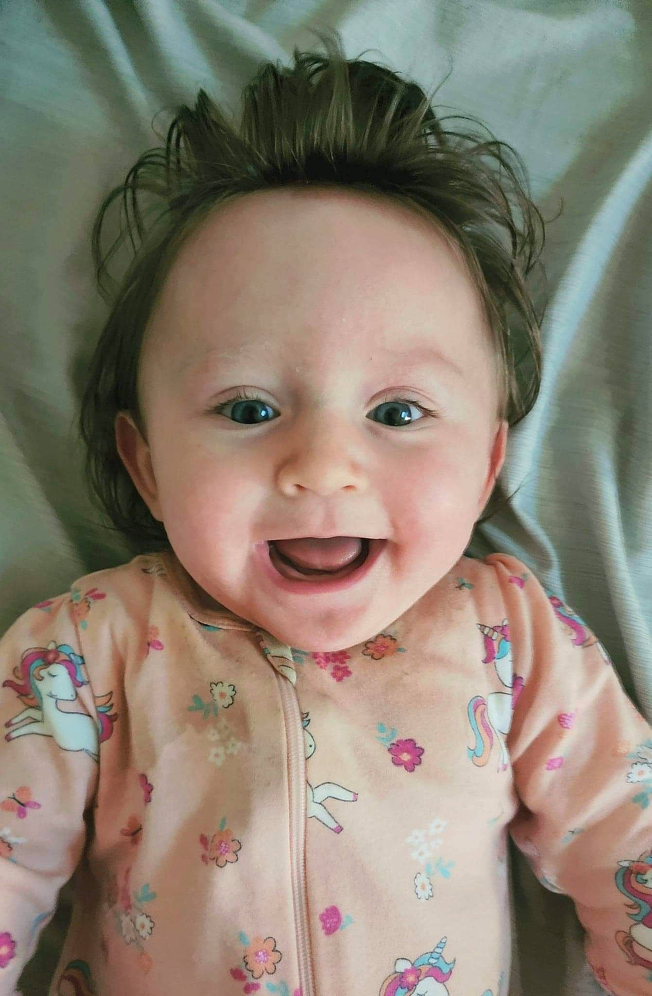 Alison is registered to the contest to win money with this photo: baby_toddler_clothing, cheek, chin, eye, eyebrow, eyelash, face, head, iris, lip, mouth, neck, nose, organ, outerwear, person, product, skin, sleeve, smile