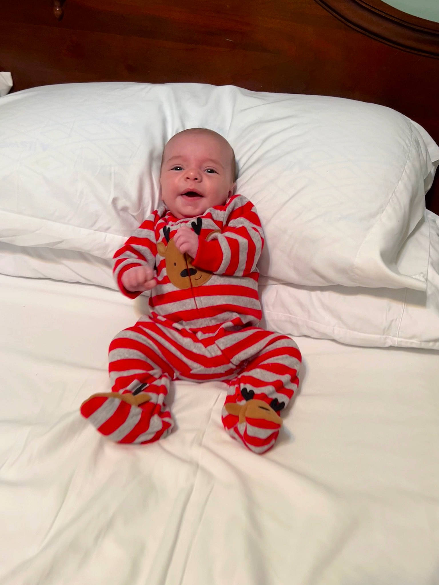 Brayden joined the competition — help win amazing prizes! baby, baby_toddler_clothing, bedding, carmine, child, comfort, couch, dress, flooring, fun, happy, linens, pattern, person, room, sitting, skin, sleeve, smile, textile