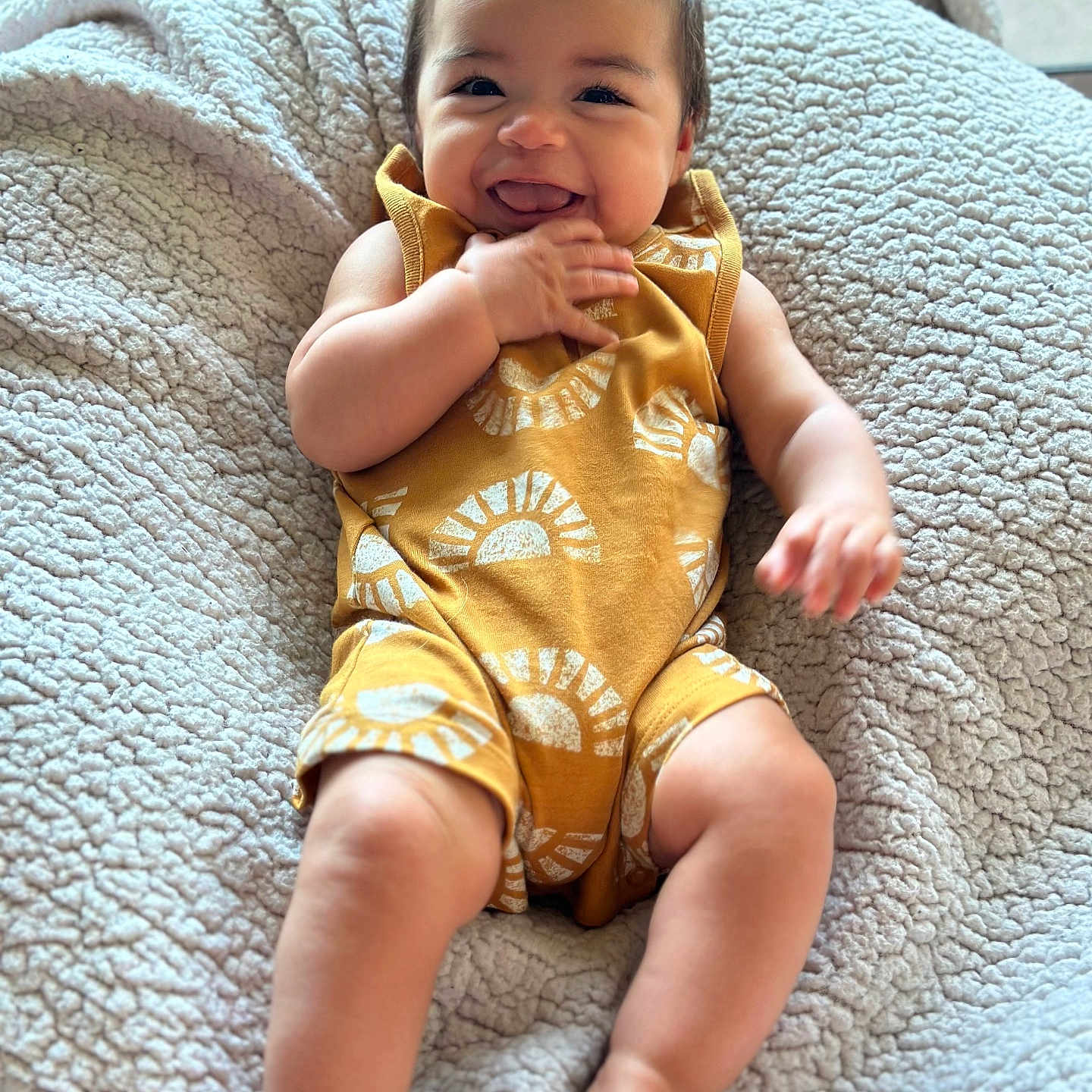 Apollo joined the competition — help win amazing prizes! baby, babylaughing, blanket, clothing, cushion, face, furniture, happy, head, homedecor, laughing, pants, person, photography, portrait, quilt, shorts, sitting, smile, t_shirt