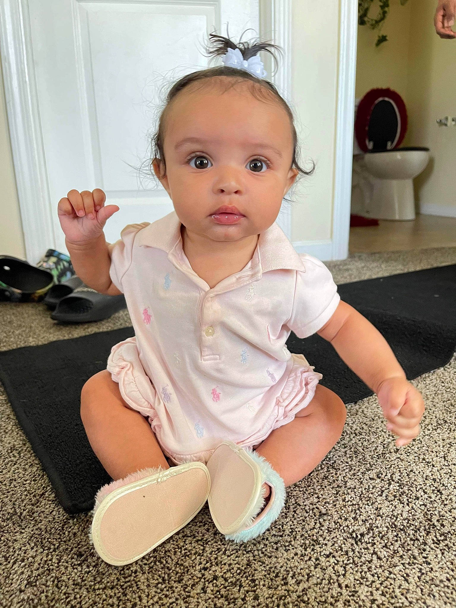Jamylah is registered to the contest to win money with this photo: baby, baby_toddler_clothing, cheek, child, dress, flooring, foot, happy, head, human_leg, iris, jewellery, knee, person, sitting, skin, sleeve, standing, thumb, toddler