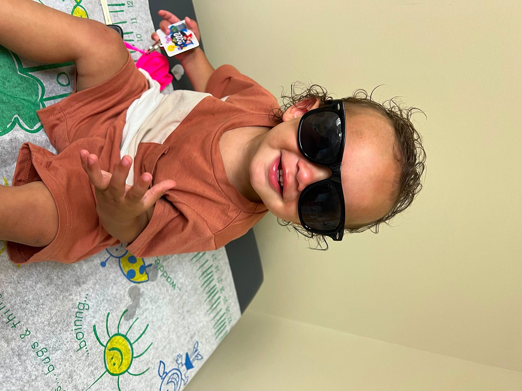 Kaius joined the competition — help win amazing prizes! baby, child, comfort, eyelash, eyewear, fashion_design, fun, glasses, happy, human_body, mouth, neck, pattern, person, personal_protective_equipment, room, smile, sunglasses, thigh, toddler
