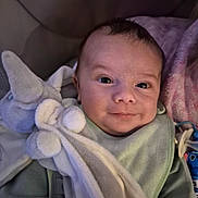 Tyano a rejoint le concours — aidez-le/la à gagner de superbes lots ! baby, infant, smile, face, blanket, plush_toy, elephant, pacifier, clothing, soft, cute, child, young, indoors, portrait, cozy, warm, comfort, person, closeup