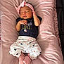 Laylin is registered to the contest to win money with this photo: baby, newborn, sleeping, pink, headband, socks, heart_pattern, clothing, cute, infant, cushion, soft, girl, peaceful, lying_down, adorable, child, toddler, portrait, indoor