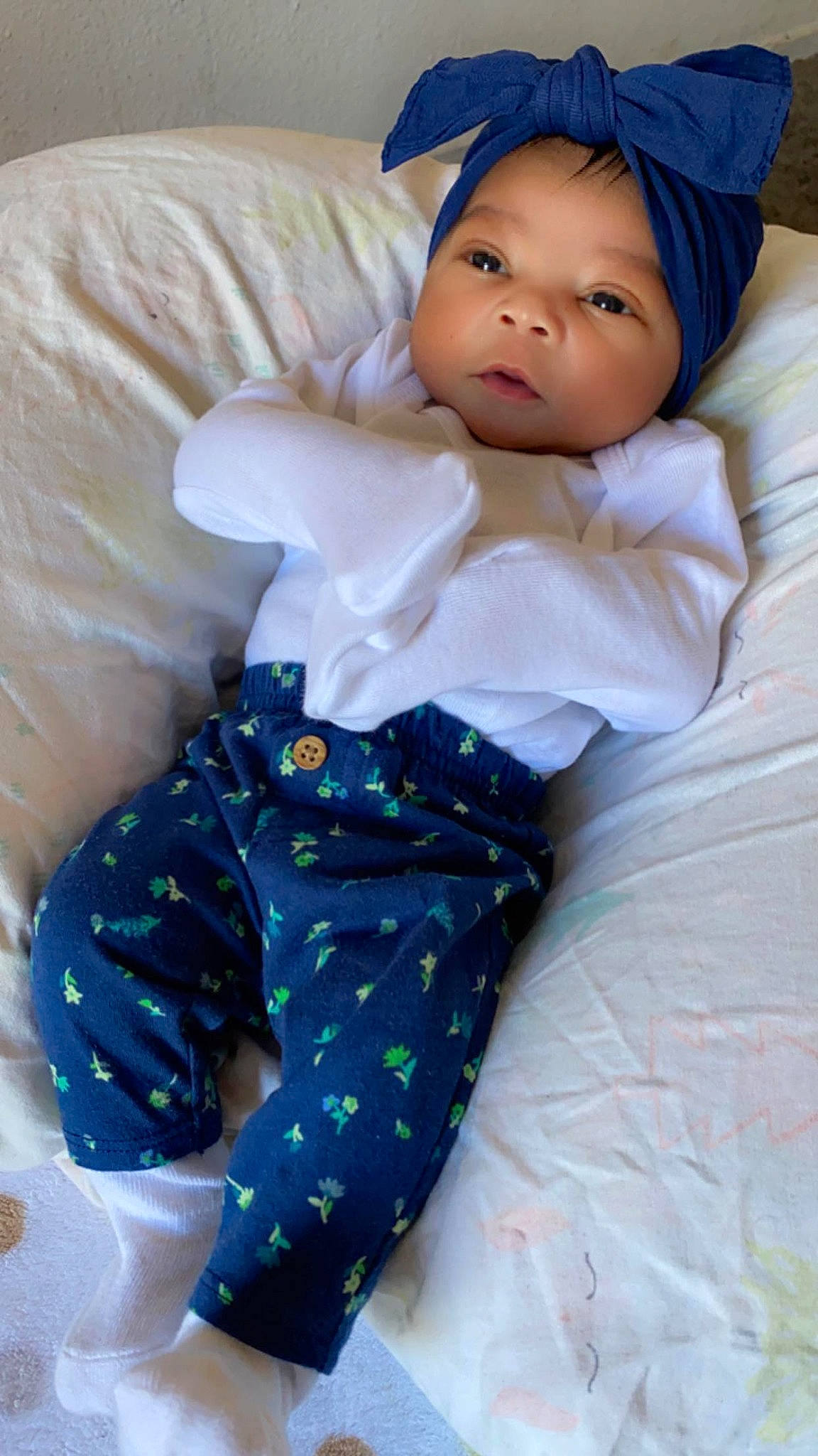 Amirra joined the competition — help win amazing prizes! baby, baby_sleeping, baby_toddler_clothing, beanie, cap, cheek, child, comfort, electric_blue, eye, face, head, headwear, knit_cap, linens, person, sitting, skin, sleeve, textile