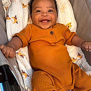 Adonis joined the competition — help win amazing prizes! baby, bed, bodypart, clothing, couch, crib, cushion, face, finger, furniture, hand, happy, head, infantbed, knitwear, person, photography, portrait, smile, sweater